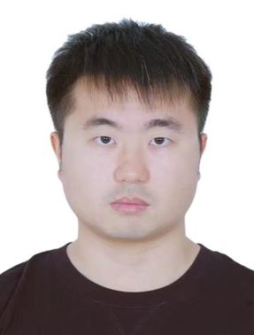 A person with short hair wearing a black shirt

Description automatically generated